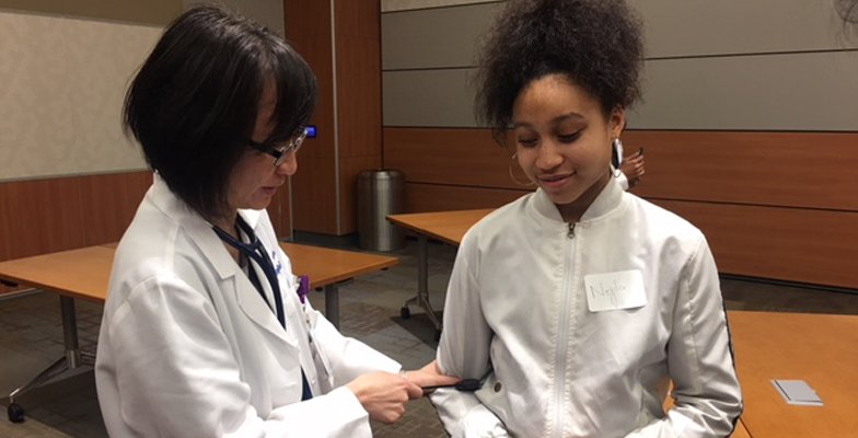 Dr. Ghidora teaches a class as part of international medical mission work.